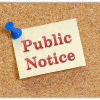 public notice postit on a cork board